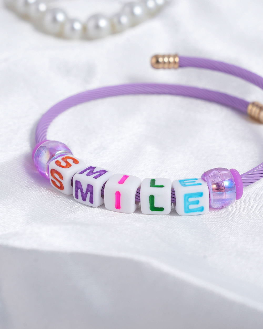 Eminent Smile Charm Bracelet