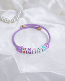 Eminent Smile Charm Bracelet