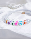 Eminent Smile Charm Bracelet